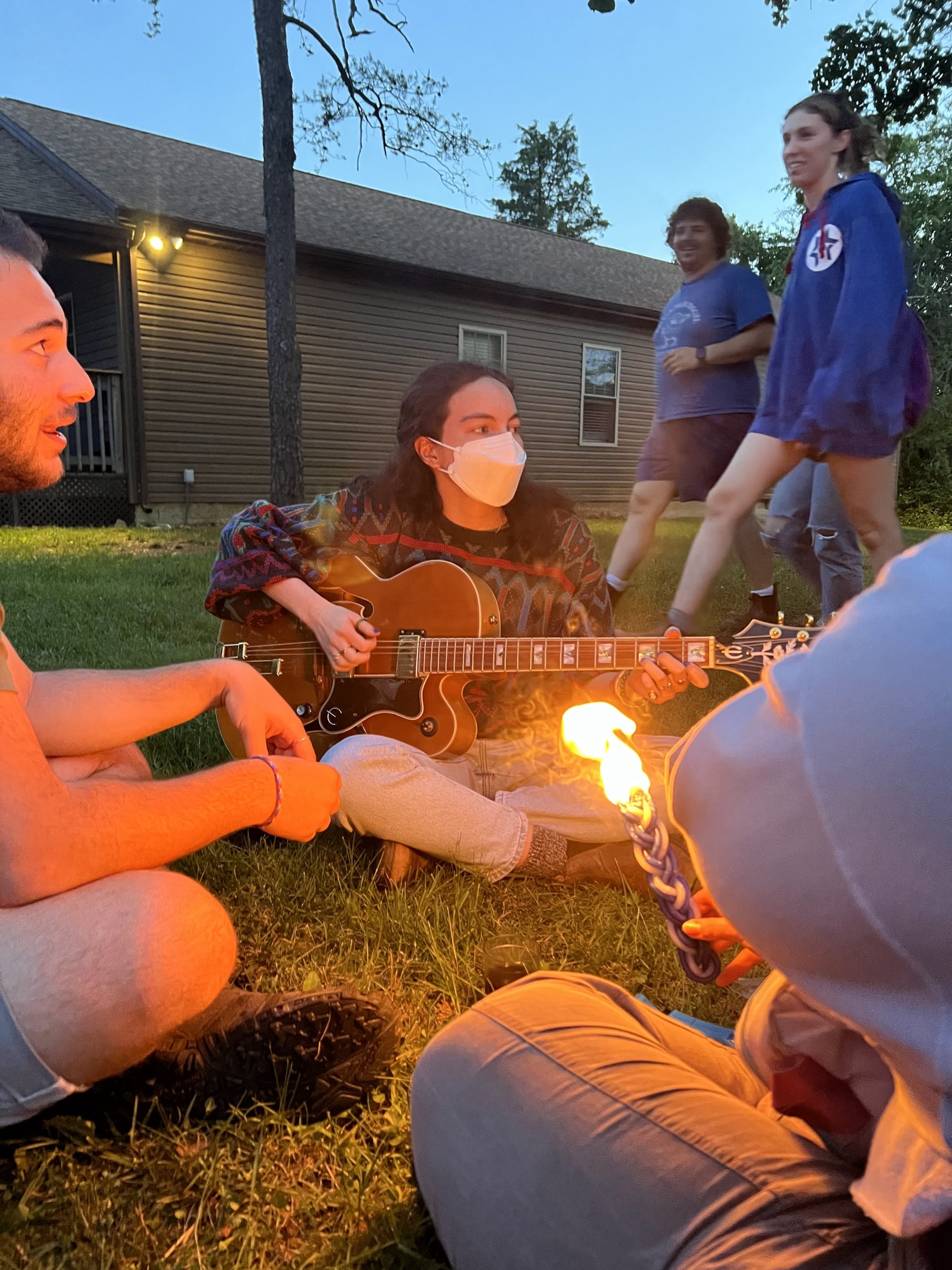 Habonim Dror MBI Program participants at a campfire.